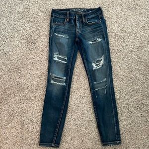 American Eagle ripped skinny jeans.
